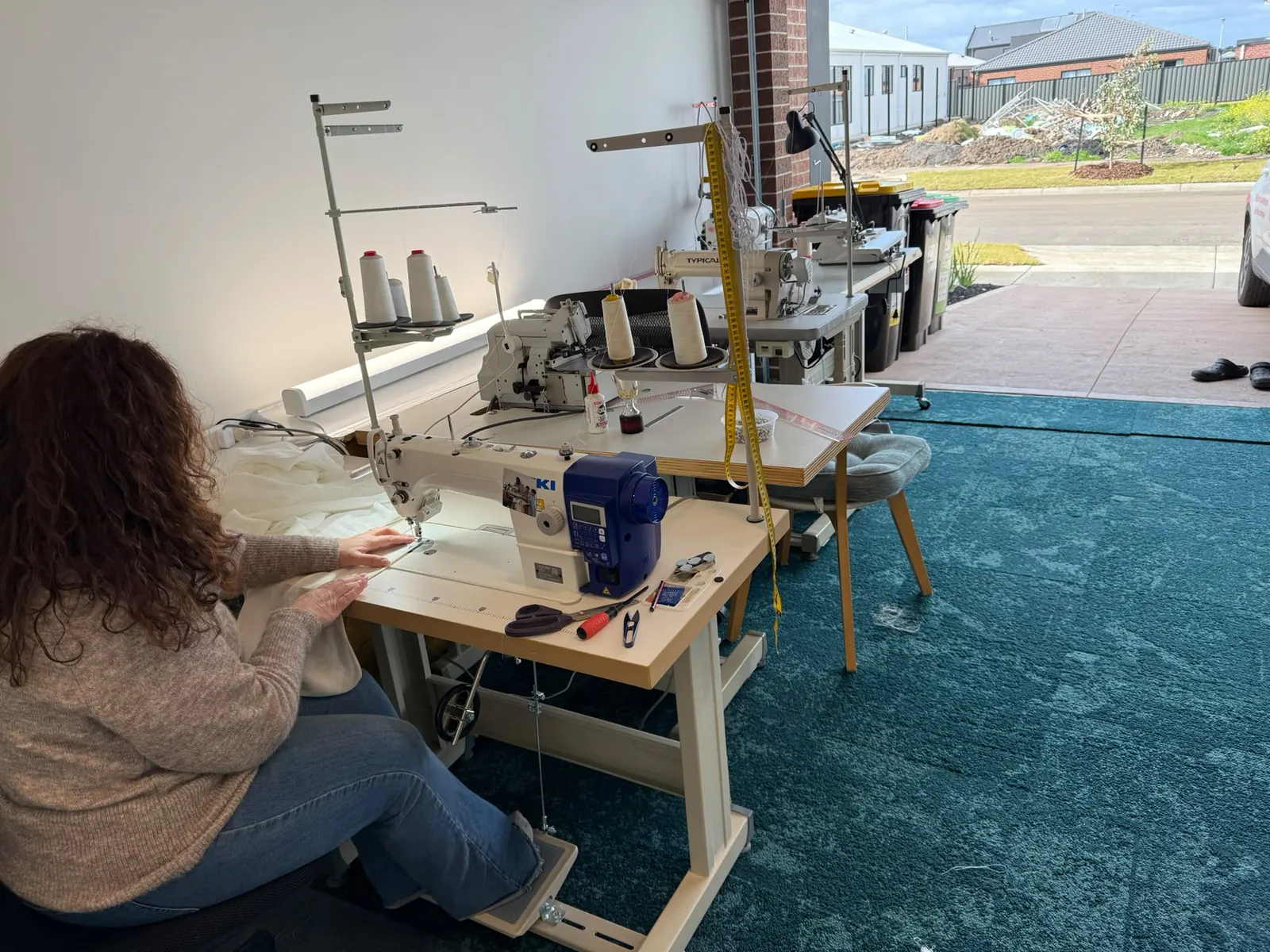 Working at a sewing machine